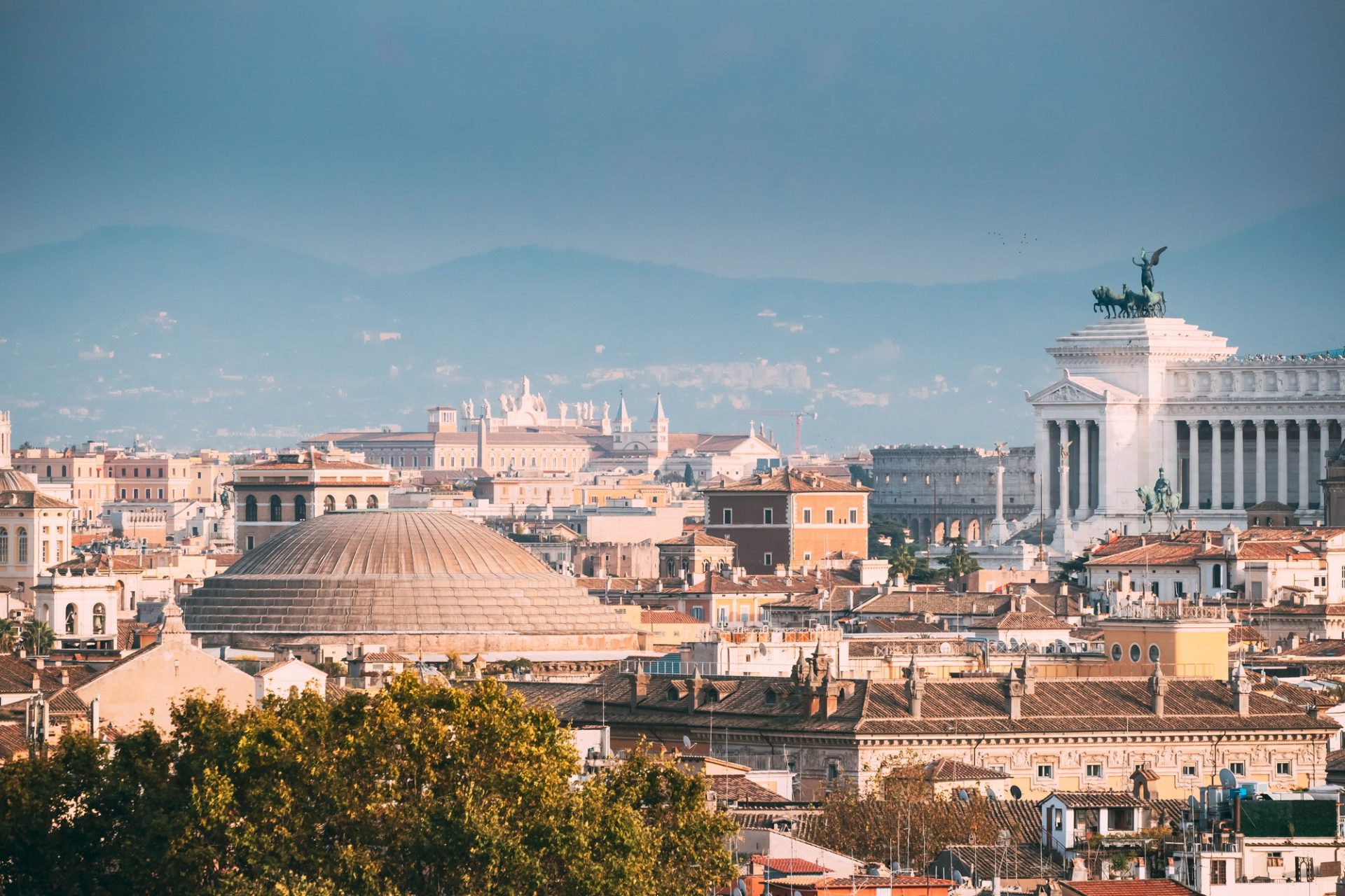 rome-italy-sloping-roof-of-pantheon-and-cityscape-QNELF4C